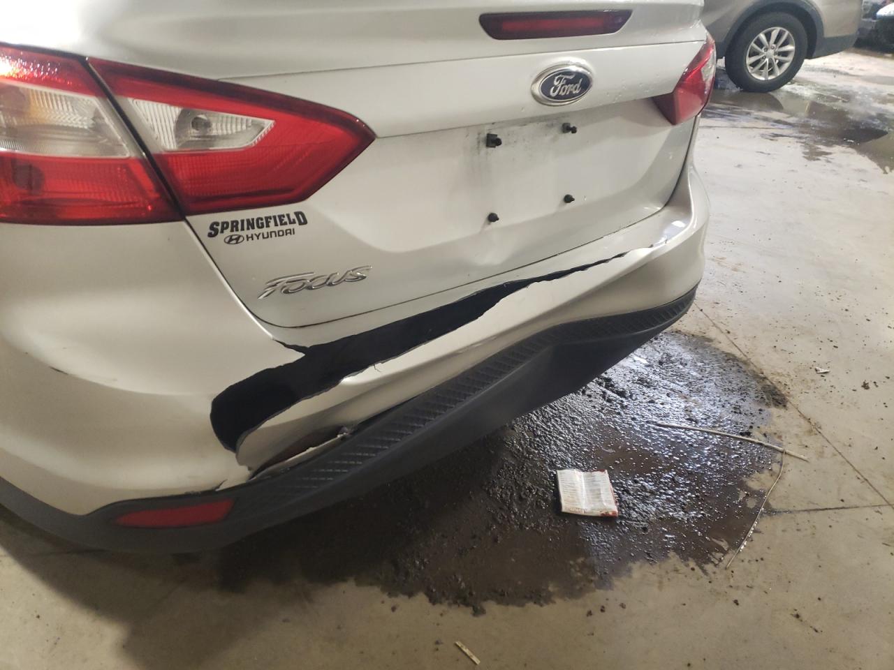 Photo 9 from auction – 2013 FORD FOCUS S with VIN 1FADP3E29DL274638