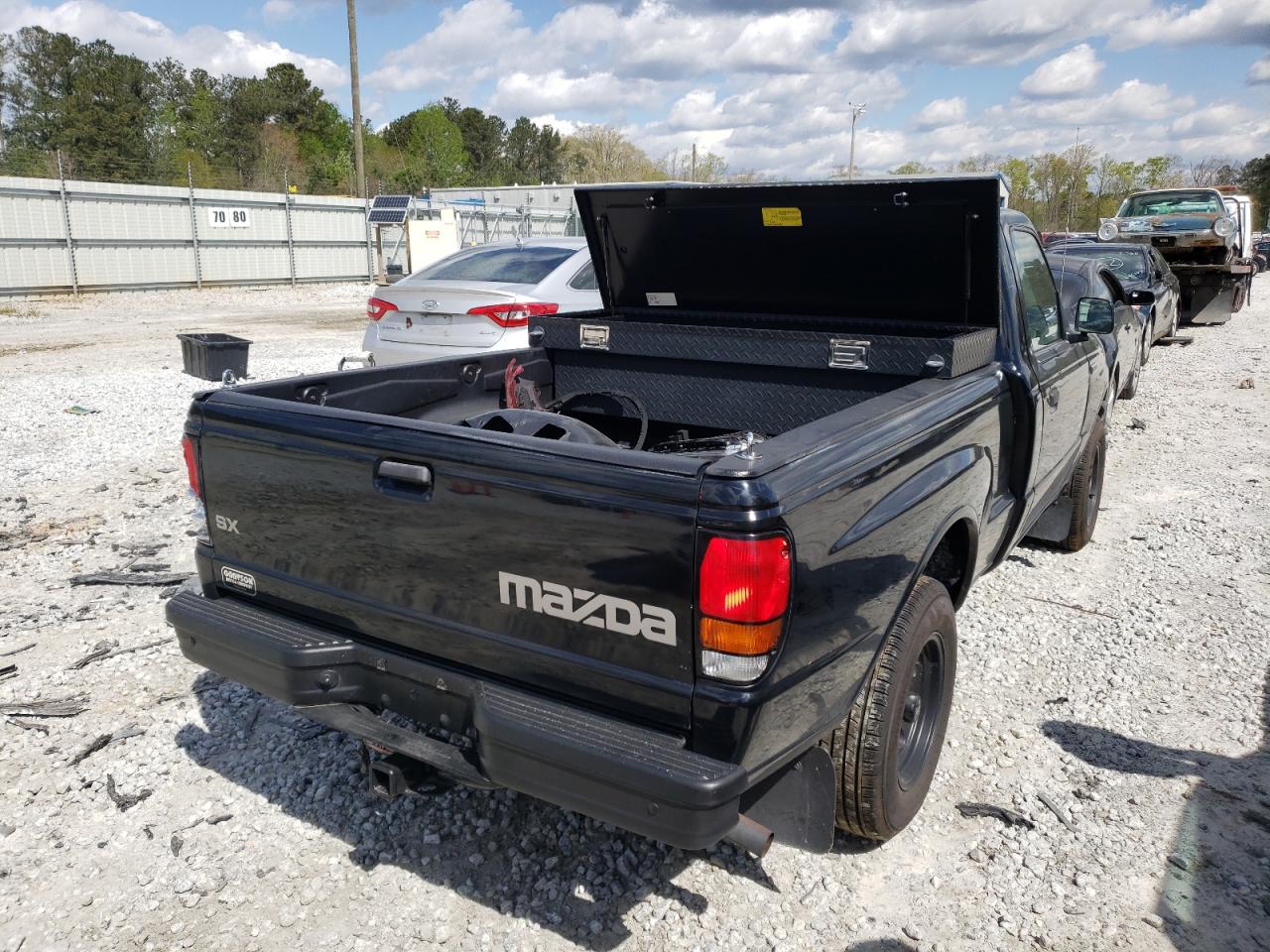Photo 4 from auction – 1999 MAZDA B2500 with VIN 4F4YR12C1XTM26169