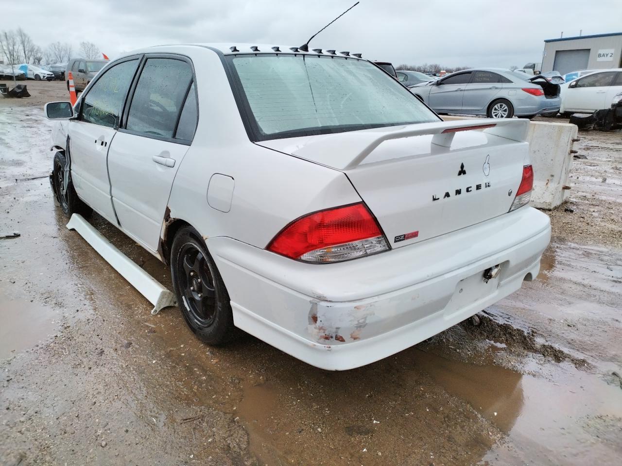 Photo 3 from auction – 2003 MITSUBISHI LANCER OZ with VIN JA3AJ86E03U056289