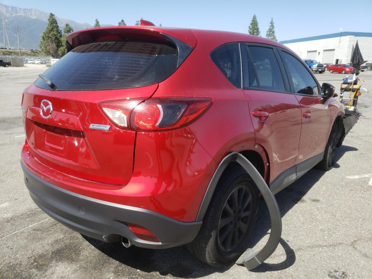 Photo 4 from auction – 2015 MAZDA CX-5 SPORT with VIN JM3KE2BE2F0548726