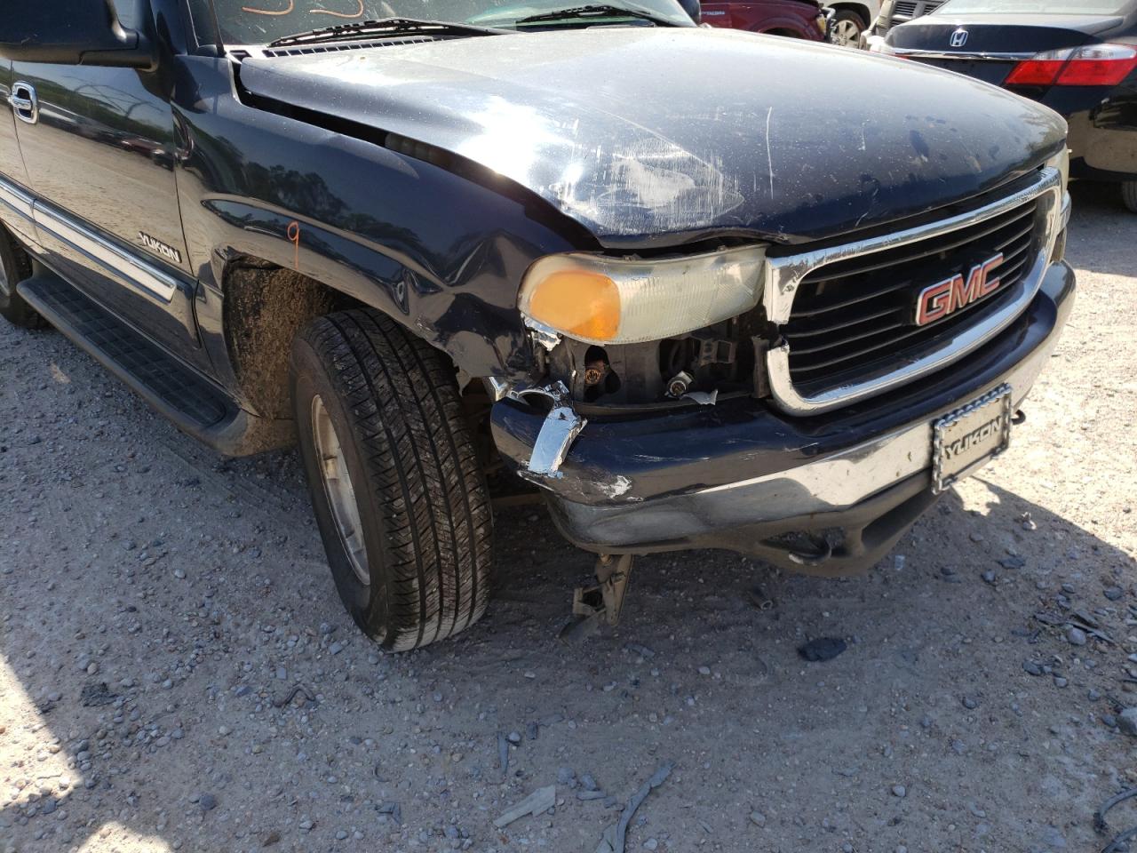 Photo 9 from auction – 2004 GMC YUKON with VIN 1GKEC13Z44R125862