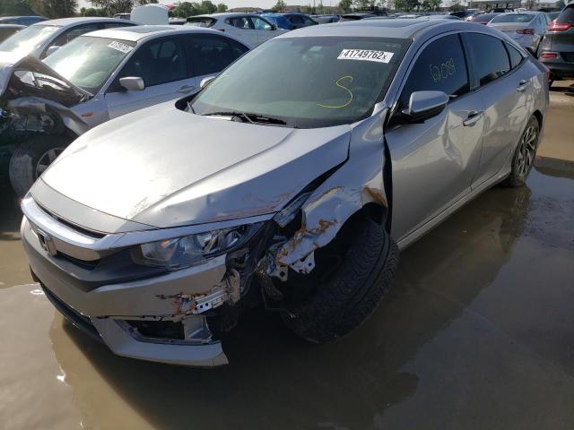 Photo 2 from auction – 2018 HONDA CIVIC EX with VIN 19XFC2F72JE025444