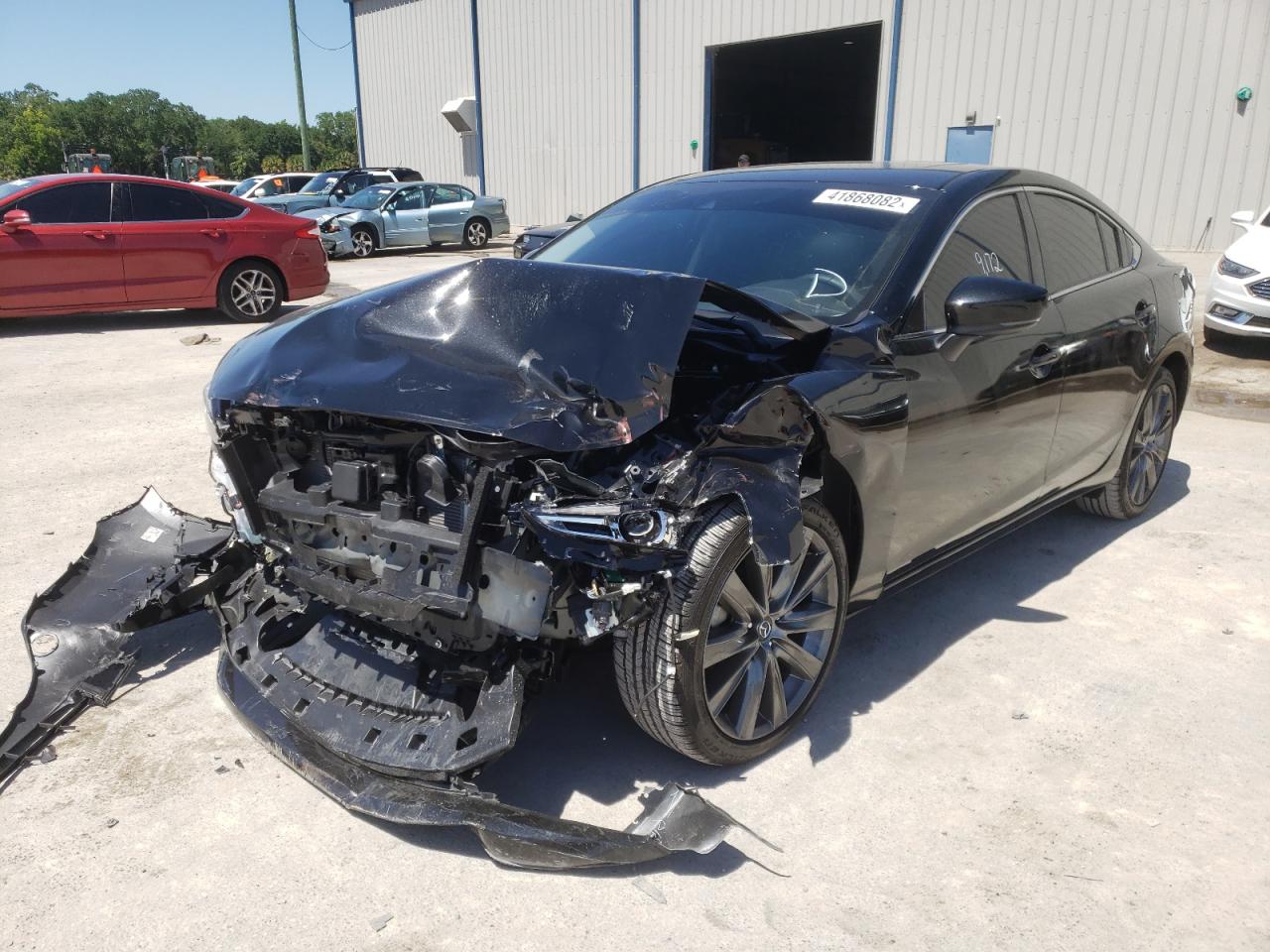 Photo 2 from auction – 2021 MAZDA 6 TOURING with VIN JM1GL1VMXM1619311