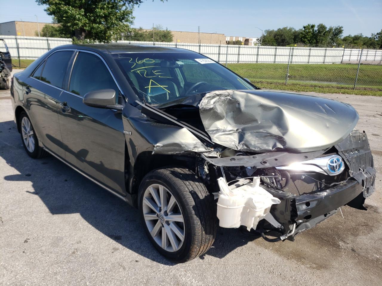 TOYOTA CAMRY HYBR 2012 with VIN 4T1BD1FK2CU036700 - Photo from auction