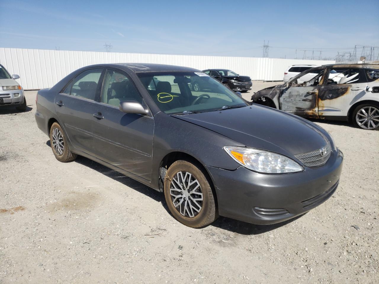 Photo 1 from auction – 2002 TOYOTA CAMRY LE with VIN JTDBE32K520091439