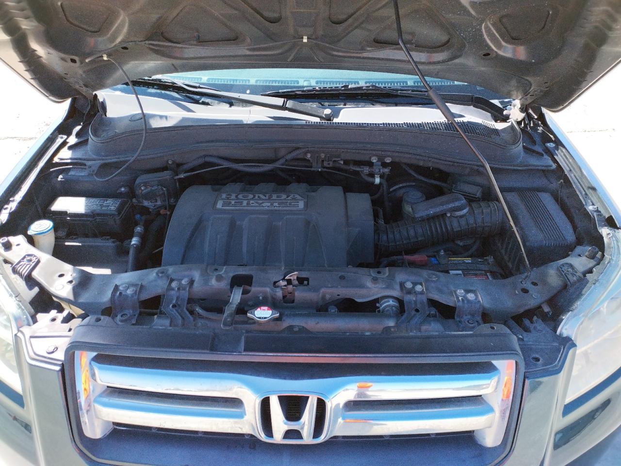 Photo 7 from auction – 2006 HONDA PILOT EX with VIN 5FNYF28506B031532