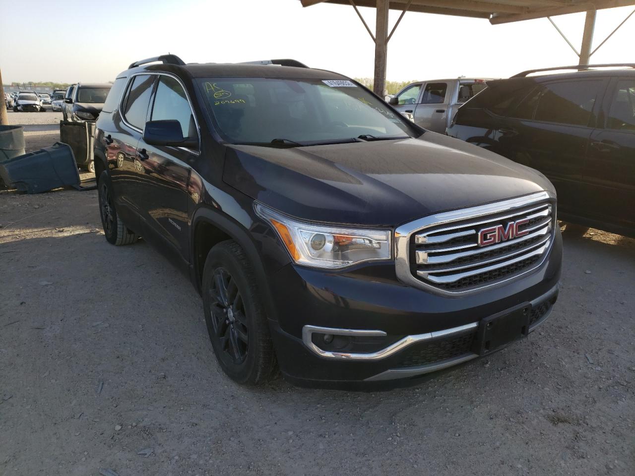 GMC ACADIA SLT 2017 with VIN 1GKKNMLS2HZ209699 - Photo from auction