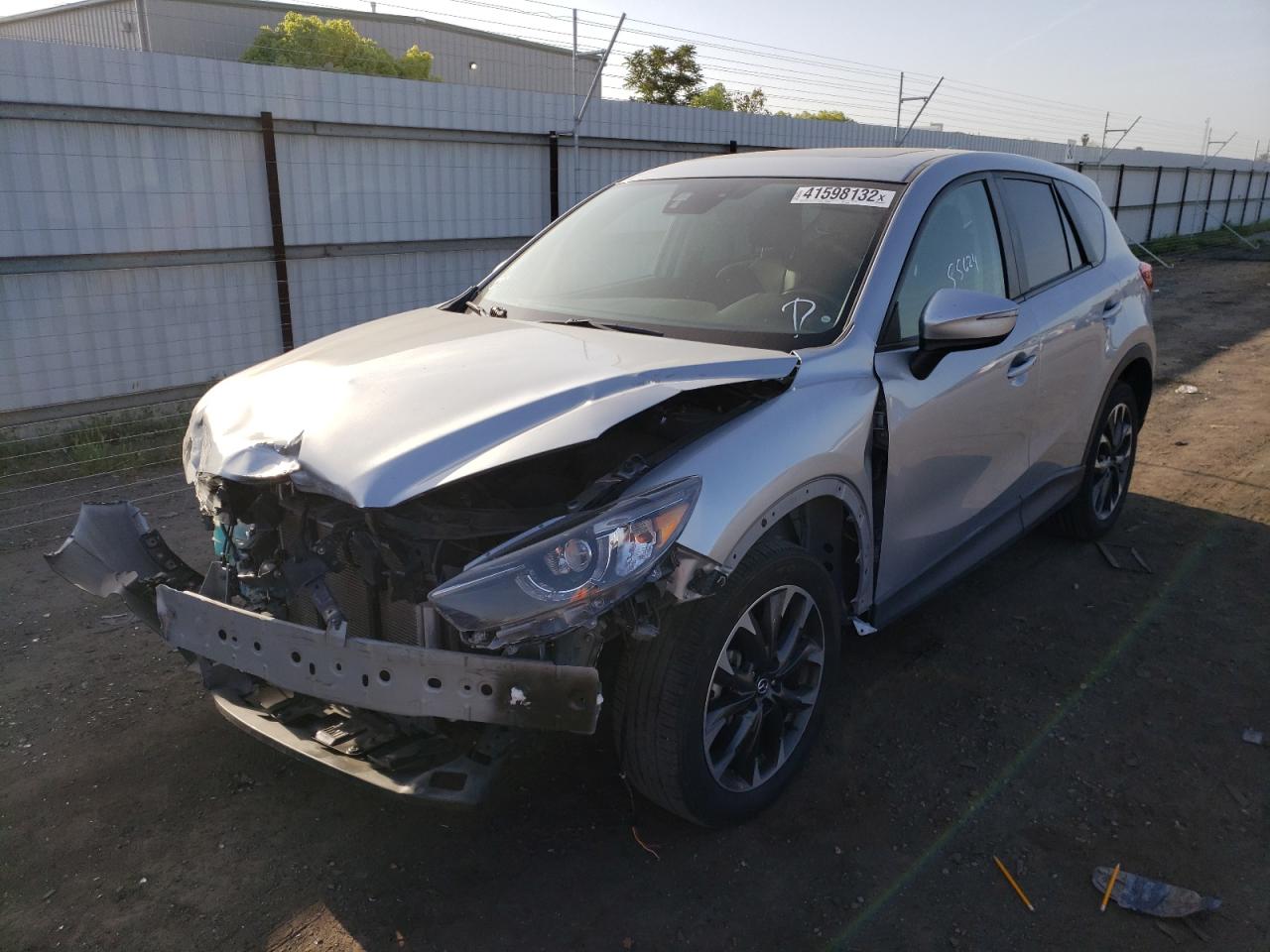 Photo 2 from auction – 2016 MAZDA CX-5 GT with VIN JM3KE2DY6G0640026