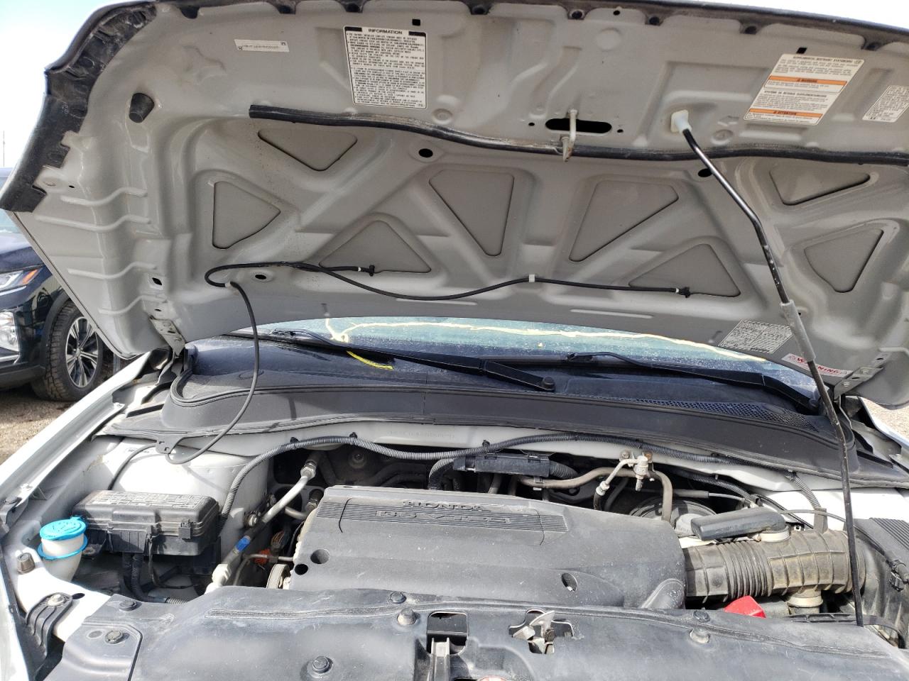 Photo 7 from auction – 2004 HONDA PILOT EX with VIN 2HKYF18434H000291