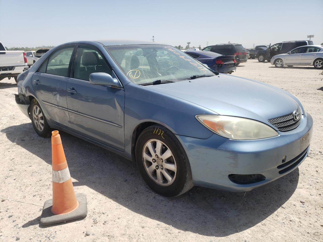 Photo 1 from auction – 2002 TOYOTA CAMRY LE with VIN JTDBE30KX20097594