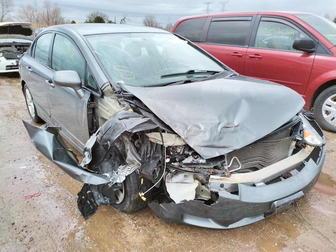 HONDA CIVIC LX 2011 with VIN 19XFA1F57BE026105 - Photo from auction