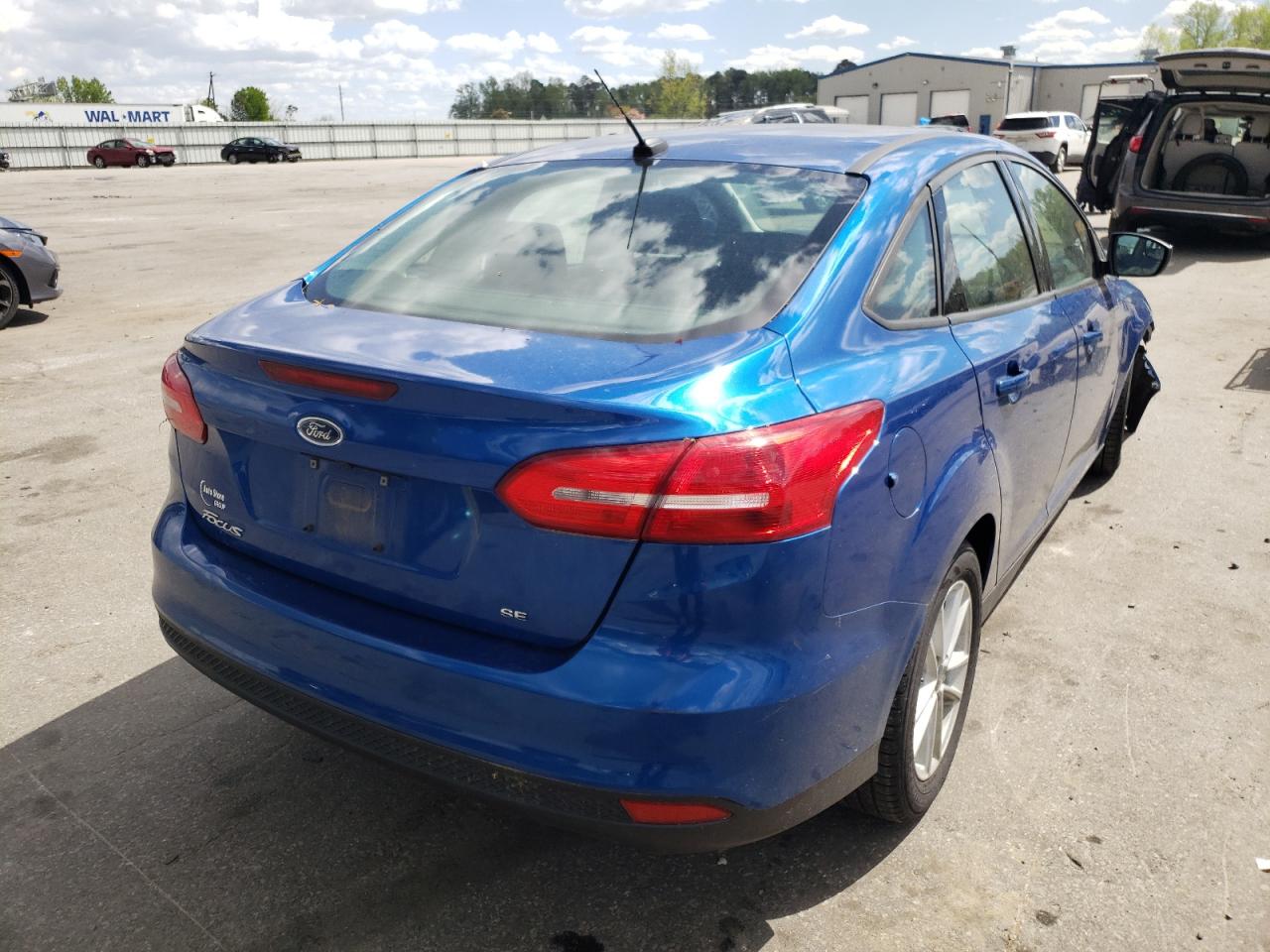 Photo 4 from auction – 2018 FORD FOCUS SE with VIN 1FADP3F24JL220156
