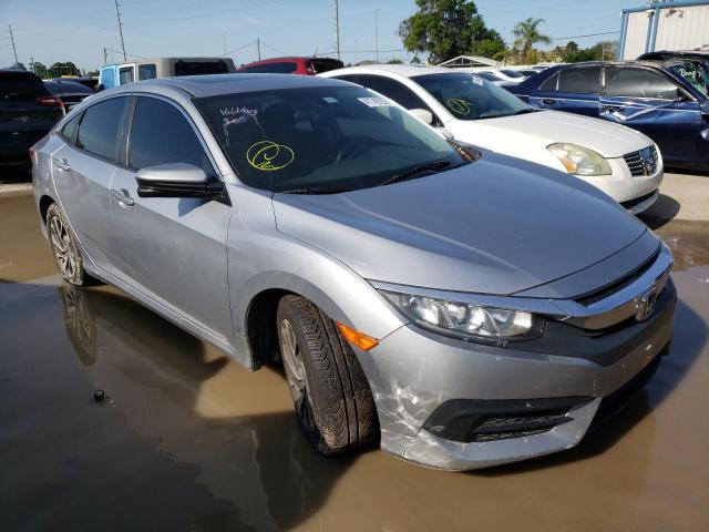 HONDA CIVIC EX 2018 with VIN 19XFC2F72JE025444 - Photo from auction