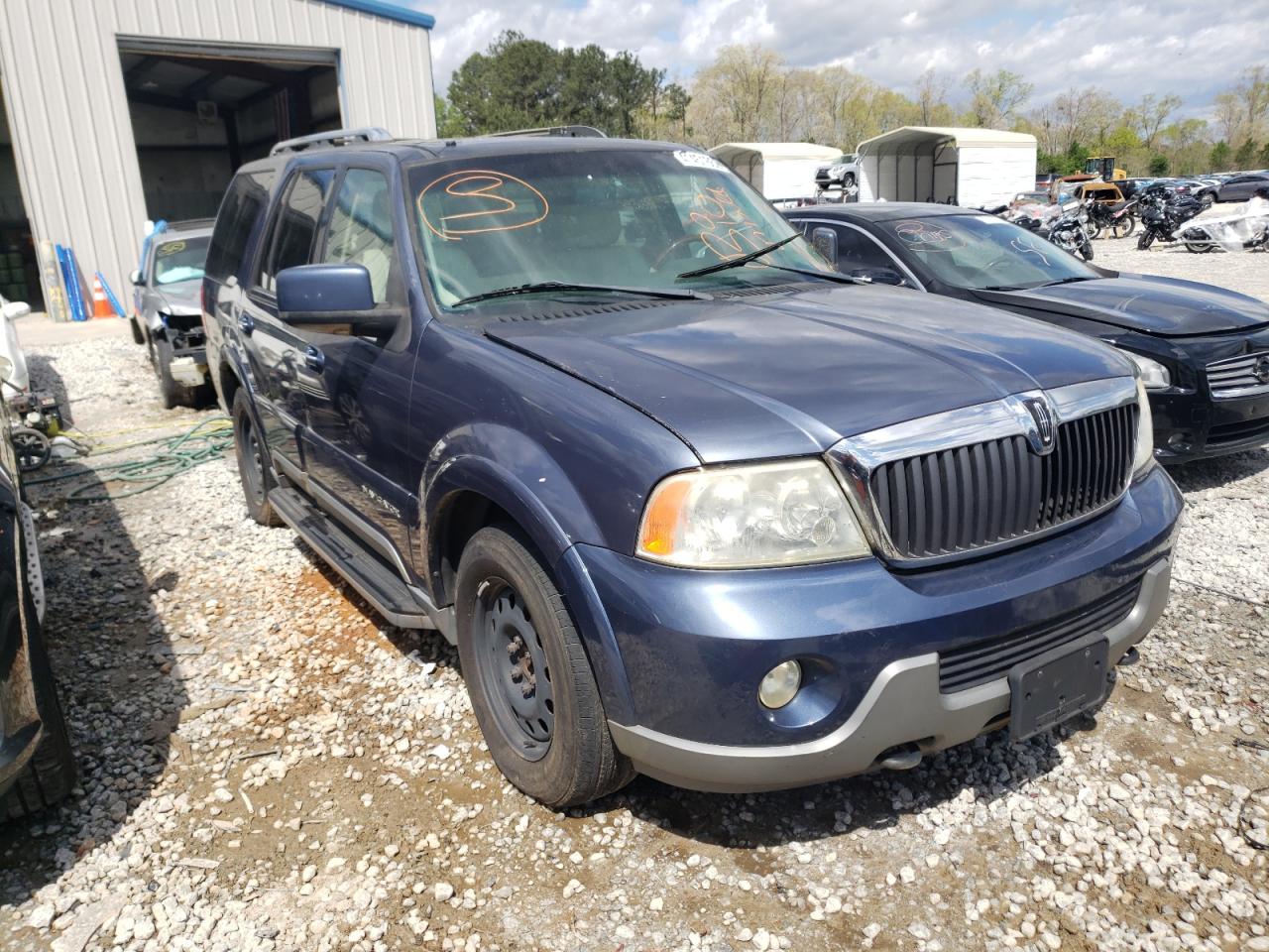 LINCOLN NAVIGATOR 2003 with VIN 5LMFU28R23LJ10119 - Photo from auction