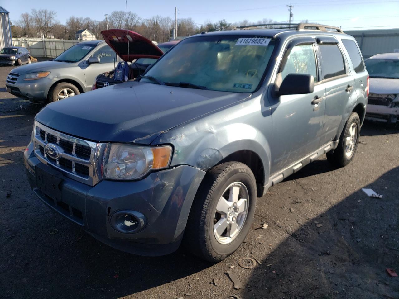 Photo 2 from auction – 2011 FORD ESCAPE XLT with VIN 1FMCU0DG2BKC27833