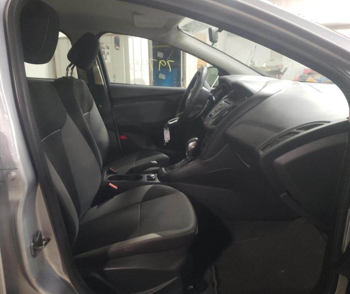 Photo 5 from auction – 2013 FORD FOCUS S with VIN 1FADP3E29DL274638