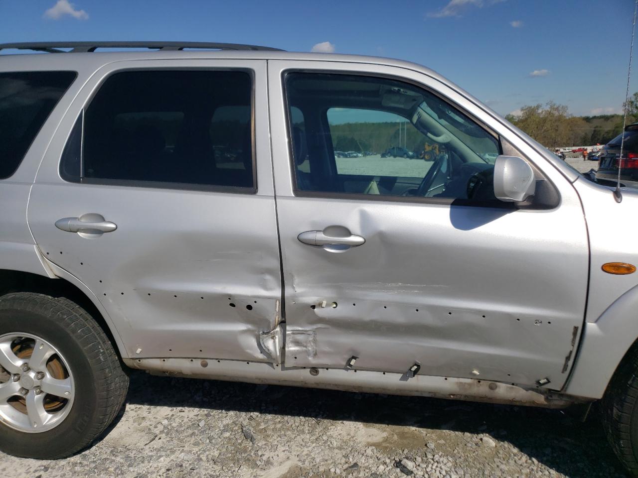 Photo 9 from auction – 2005 MAZDA TRIBUTE S with VIN 4F2CZ06105KM00235