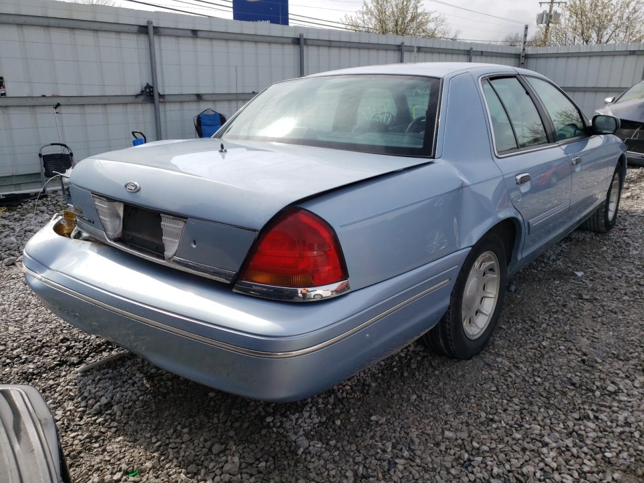 Photo 4 from auction – 1999 FORD CROWN VICT with VIN 2FAFP74W2XX196229