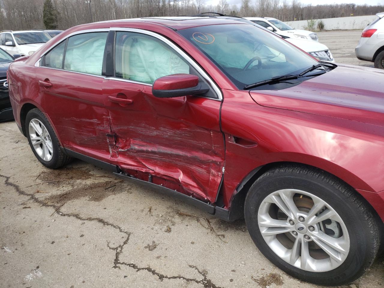 Photo 9 from auction – 2014 FORD TAURUS SEL with VIN 1FAHP2E87EG155870