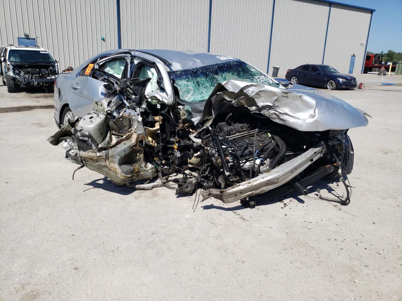 FORD TAURUS LIM 2015 with VIN 1FAHP2F89FG168992 - Photo from auction