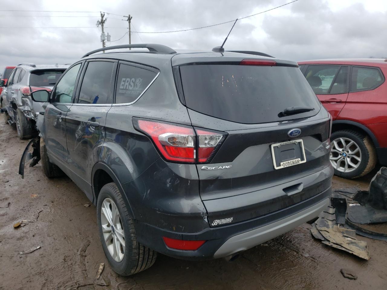 Photo 3 from auction – 2017 FORD ESCAPE SE with VIN 1FMCU9GD0HUD27402
