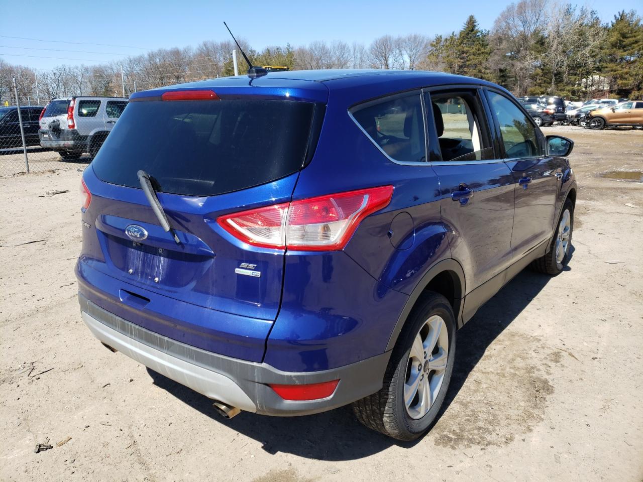 Photo 4 from auction – 2016 FORD ESCAPE SE with VIN 1FMCU9GX0GUC29592