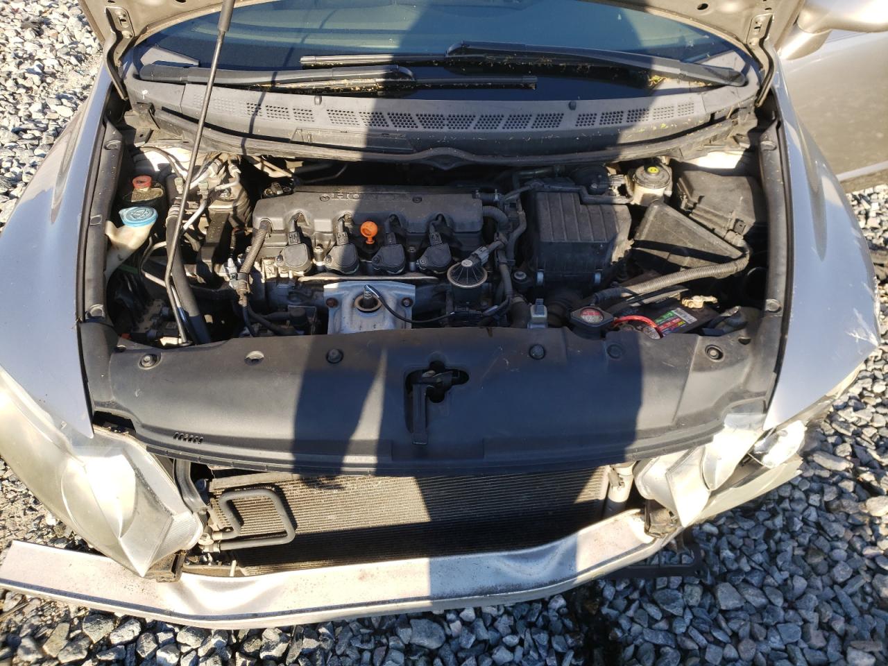Photo 7 from auction – 2006 HONDA CIVIC LX with VIN 1HGFA16586L080737