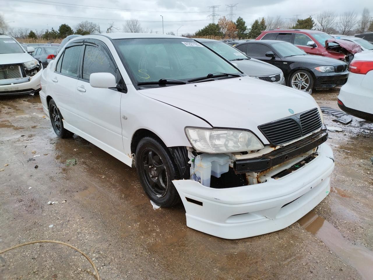 MITSUBISHI LANCER OZ 2003 with VIN JA3AJ86E03U056289 - Photo from auction