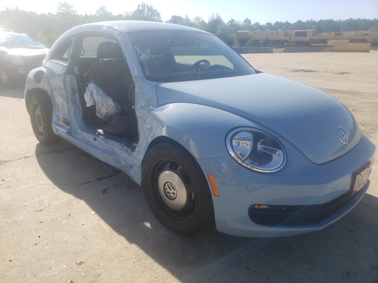 VOLKSWAGEN BEETLE 2014 with VIN 3VWJP7AT0EM609270 - Photo from auction