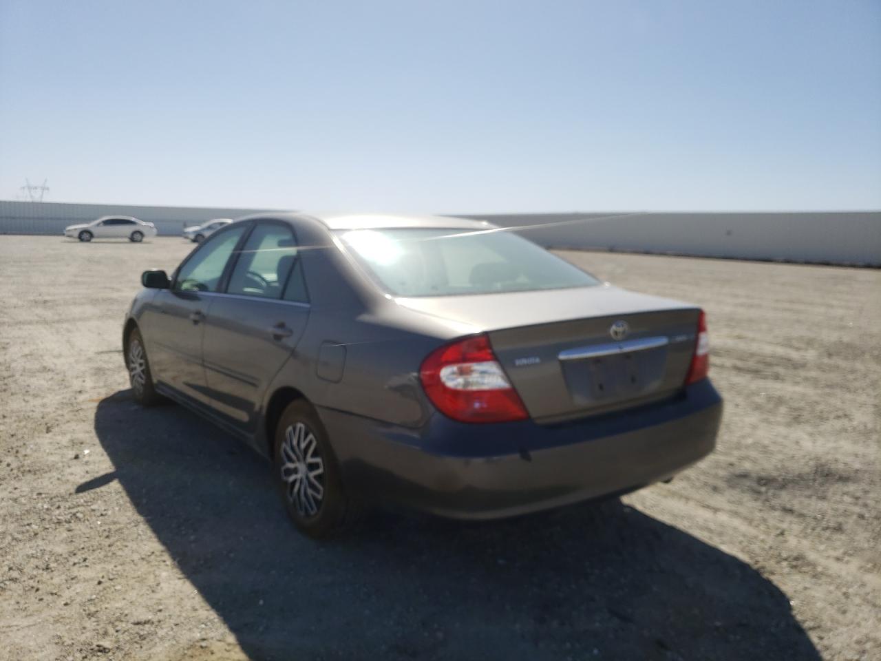 Photo 3 from auction – 2002 TOYOTA CAMRY LE with VIN JTDBE32K520091439