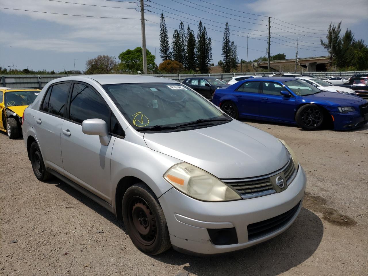 NISSAN VERSA S 2009 with VIN 3N1BC11E59L444767 - Photo from auction