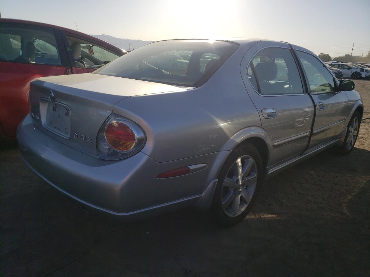 Photo 4 from auction – 2003 NISSAN MAXIMA GLE with VIN JN1DA31A43T429994