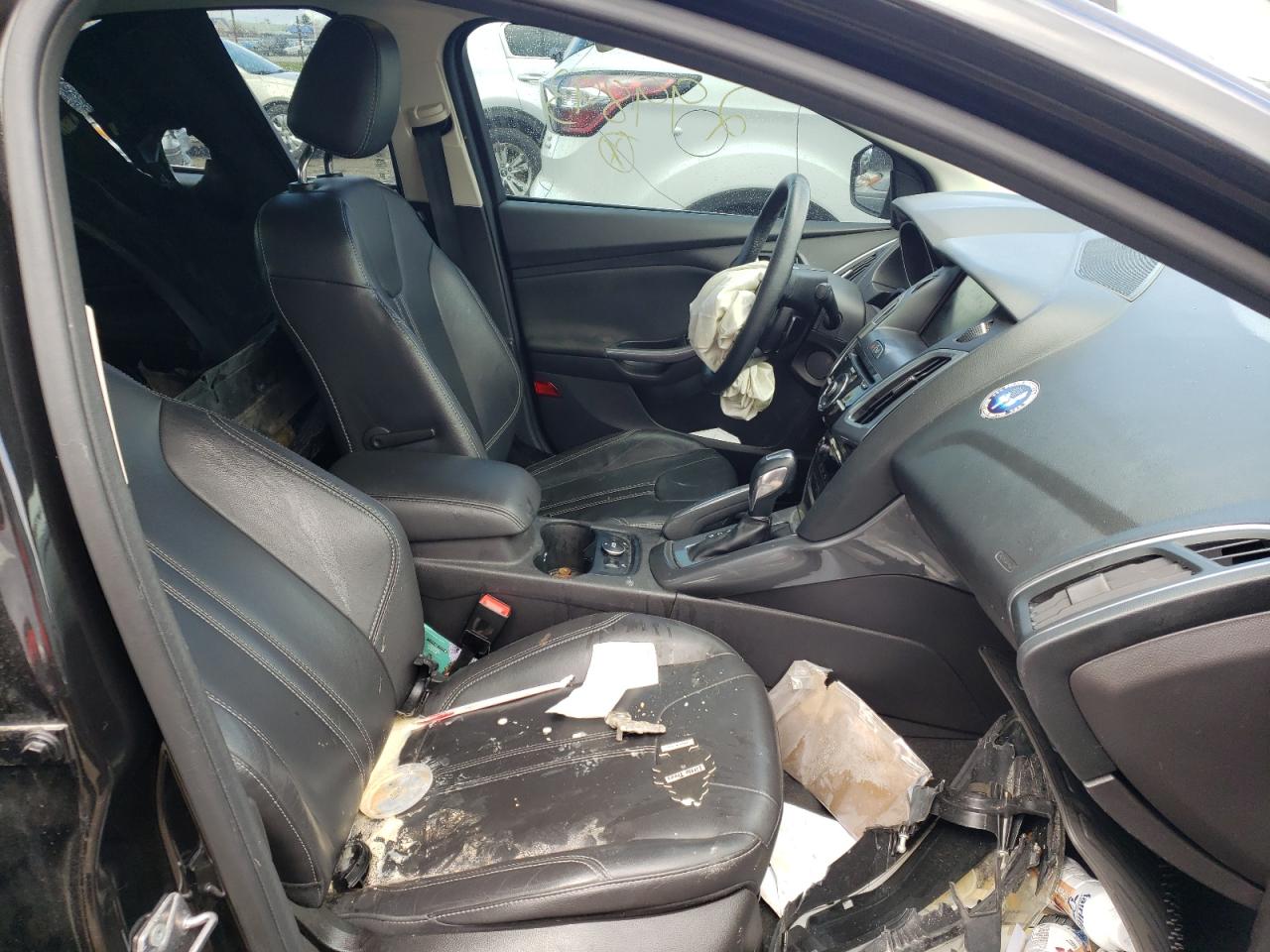 Photo 5 from auction – 2012 FORD FOCUS TITA with VIN 1FAHP3J2XCL299893