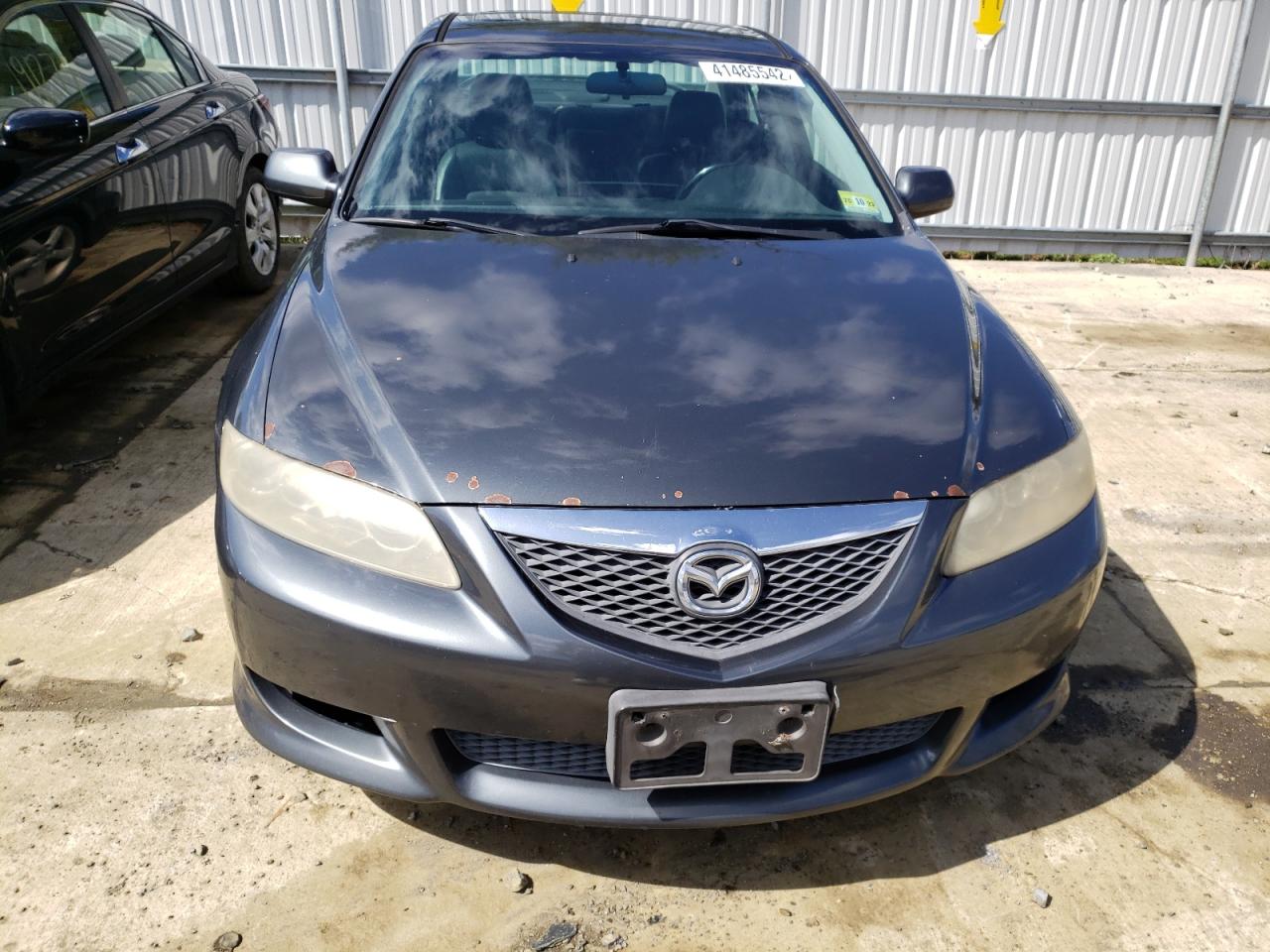 Photo 9 from auction – 2003 MAZDA 6 I with VIN 1YVHP80C135M07060