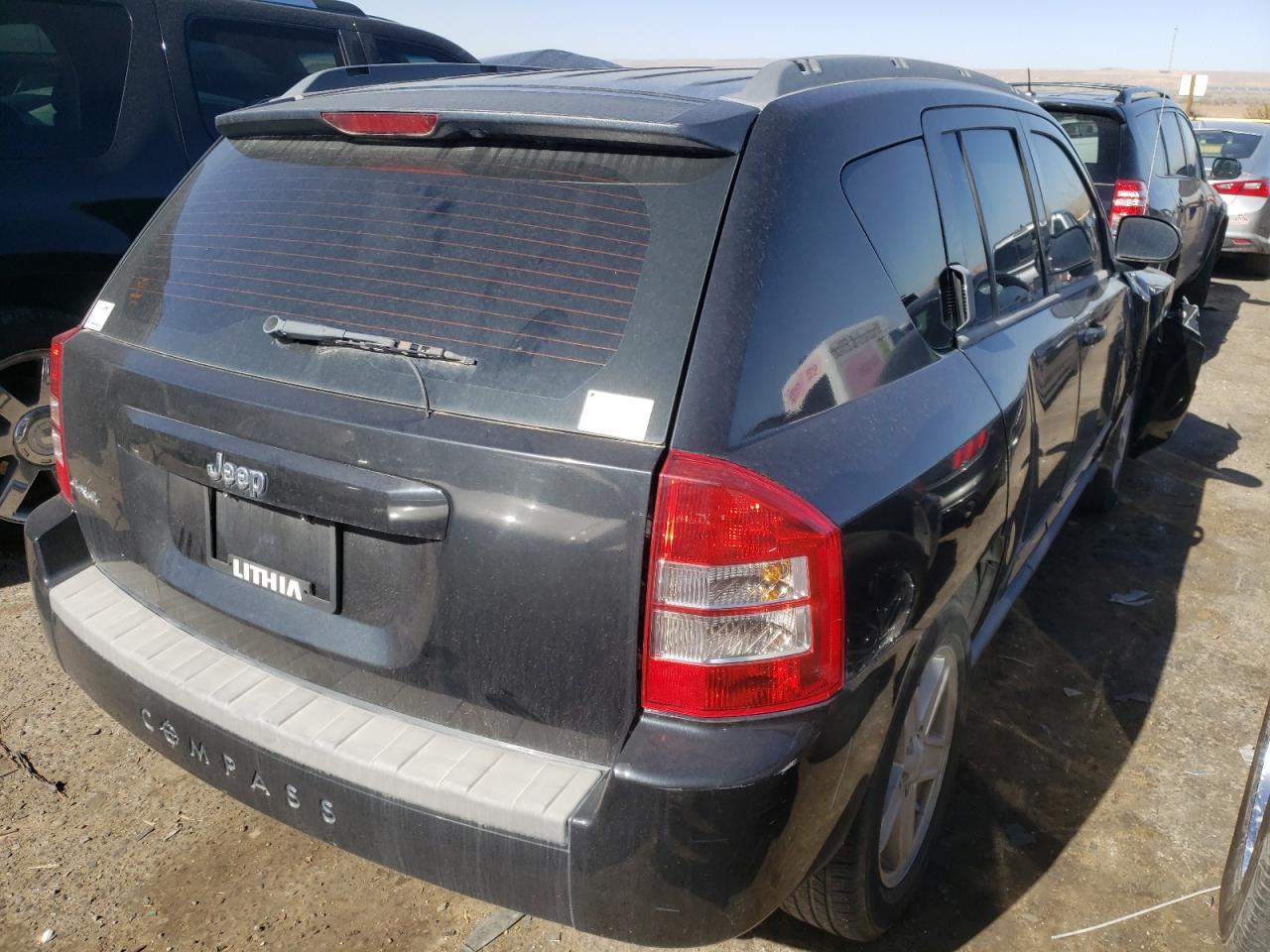 Photo 4 from auction – 2010 JEEP COMPASS SP with VIN 1J4NF4FB1AD601538