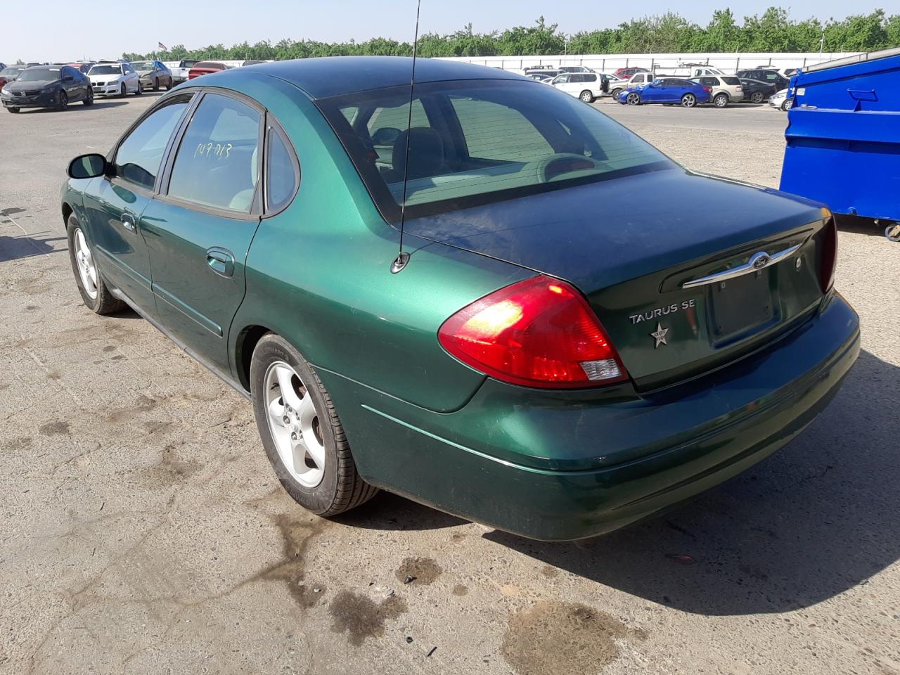 Photo 3 from auction – 2000 FORD TAURUS with VIN 1FAFP5521YG200262