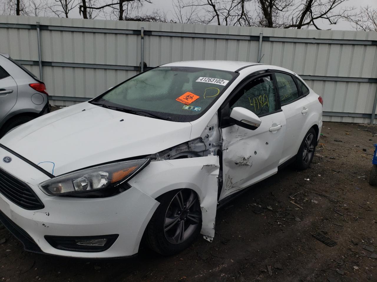 Photo 9 from auction – 2017 FORD FOCUS SE with VIN 1FADP3FE3HL289764