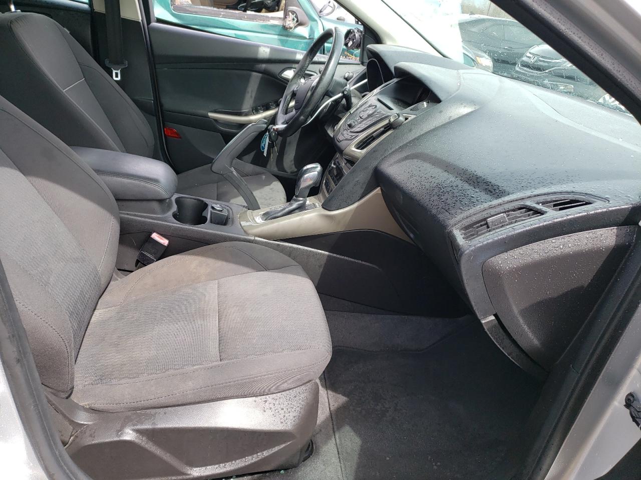 Foto 5 de la subasta – 2012 FORD FOCUS SEL con VIN 1FAHP3M21CL263179