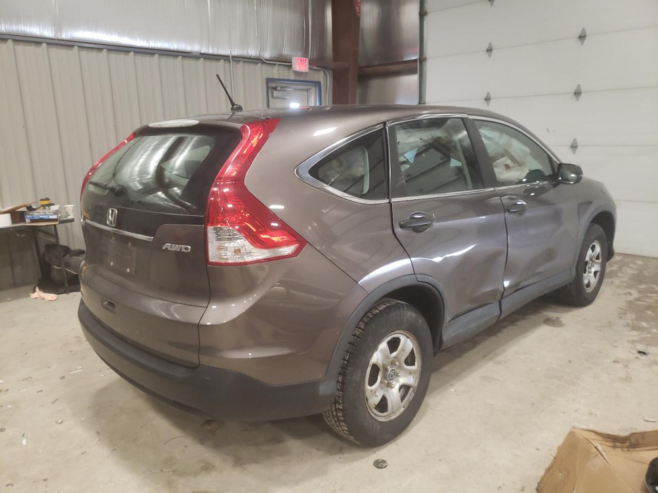 Photo 4 from auction – 2014 HONDA CR-V LX with VIN 2HKRM4H33EH689494