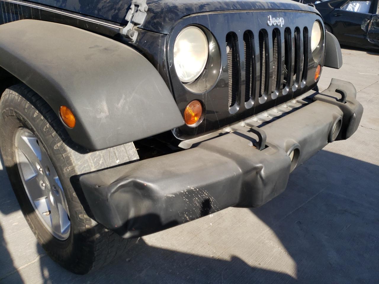 Photo 9 from auction – 2009 JEEP WRANGLER U with VIN 1J4GB39149L773971