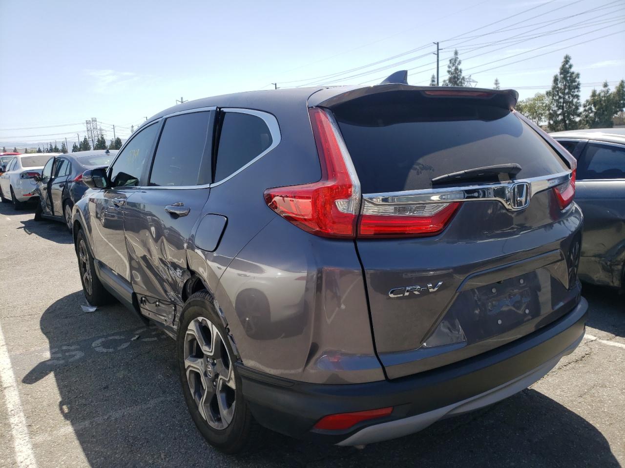 Photo 3 from auction – 2017 HONDA CR-V EX with VIN 7FARW1H54HE031149