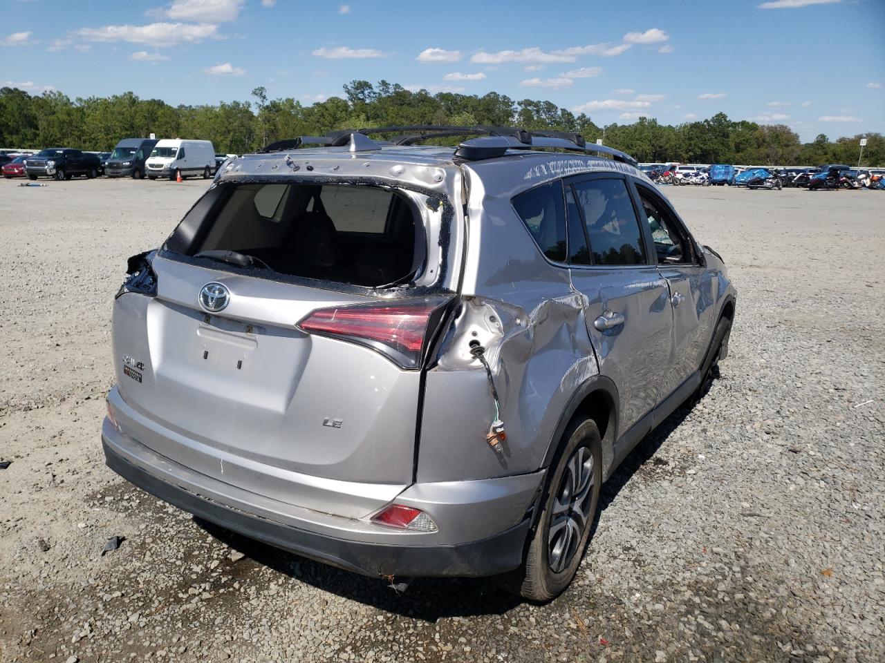 Photo 4 from auction – 2018 TOYOTA RAV4 LE with VIN JTMZFREV0JD121748