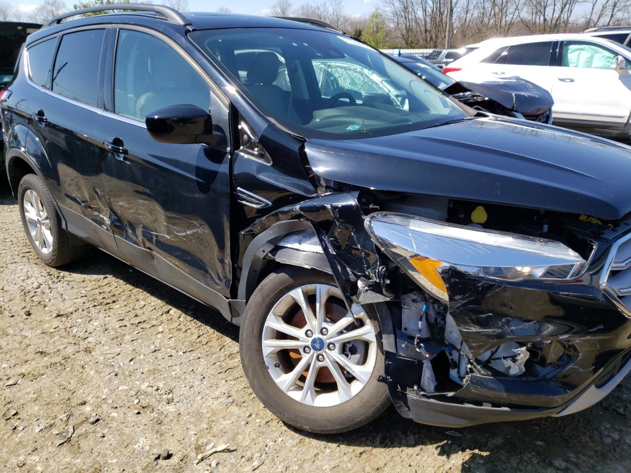 Photo 9 from auction – 2018 FORD ESCAPE SEL with VIN 1FMCU9HD4JUA15524