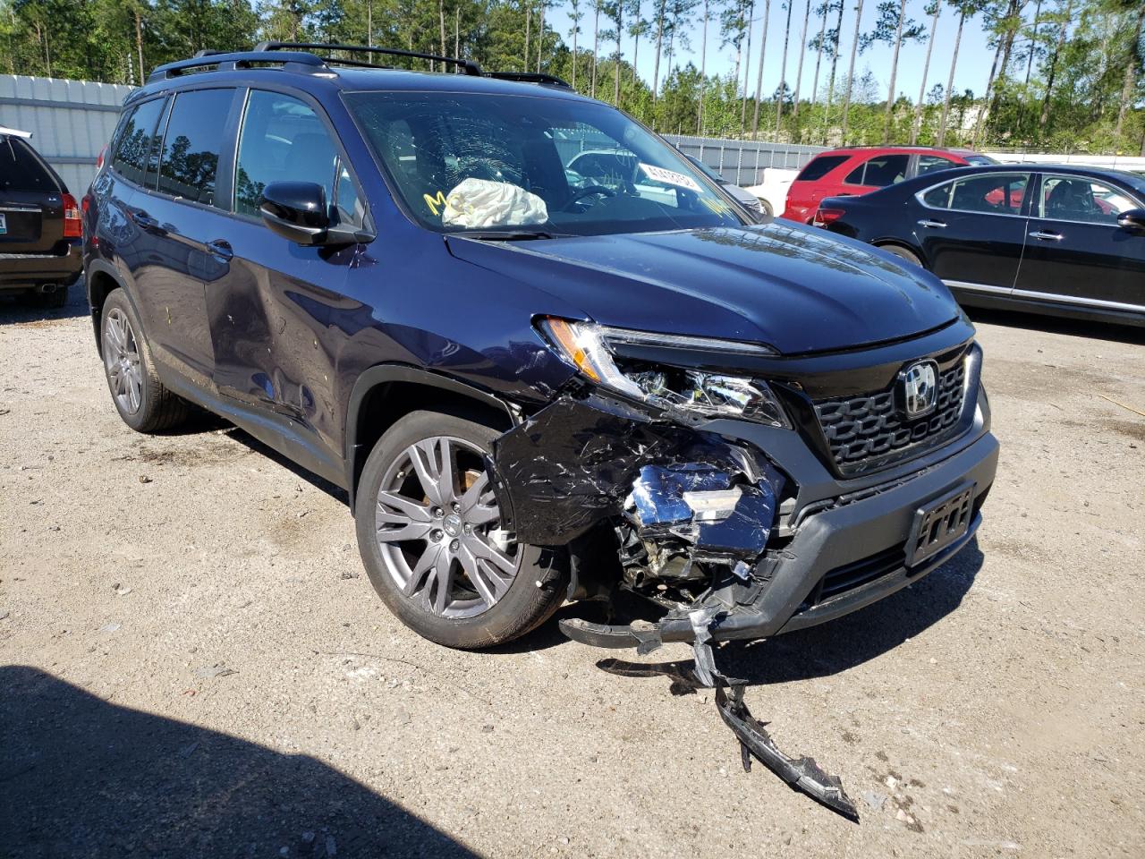 HONDA PASSPORT E 2019 with VIN 5FNYF8H57KB010254 - Photo from auction