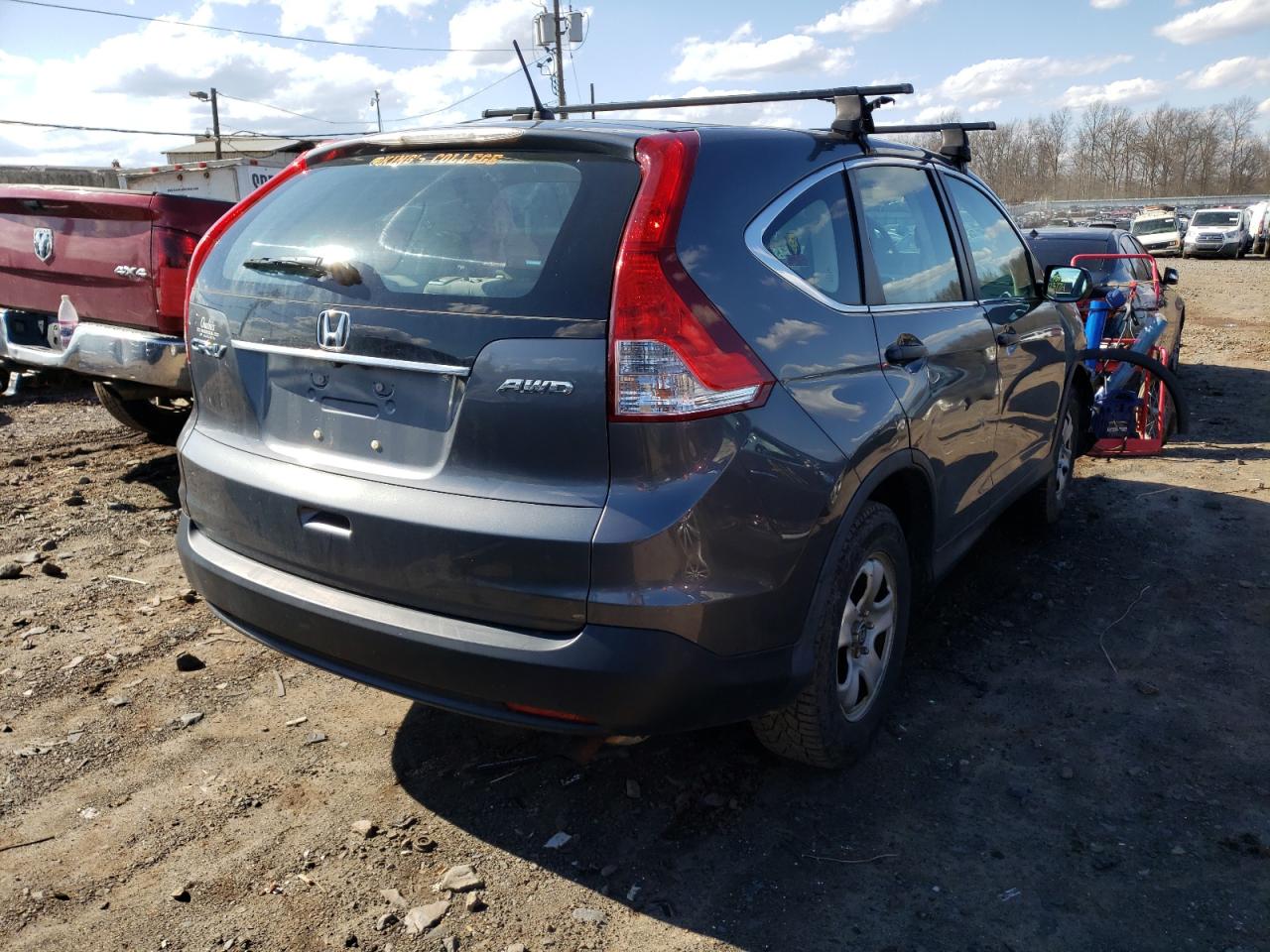 Photo 4 from auction – 2014 HONDA CR-V LX with VIN 2HKRM4H33EH644474