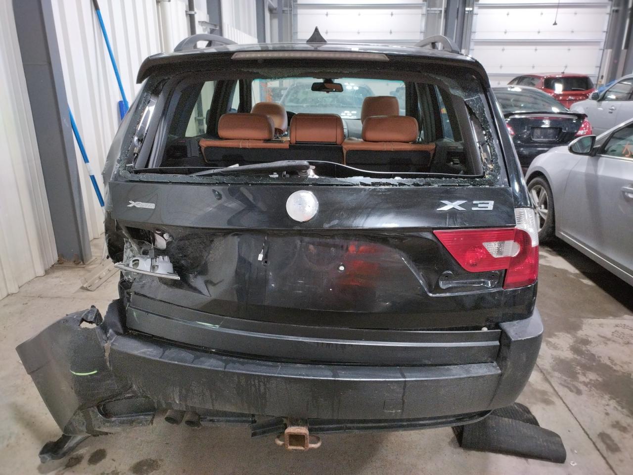 Photo 9 from auction – 2004 BMW X3 2.5I with VIN WBXPA73444WC43872