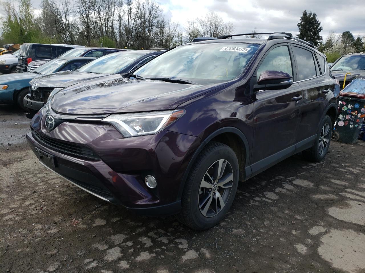 Photo 2 from auction – 2017 TOYOTA RAV4 XLE with VIN 2T3RFREV0HW616187
