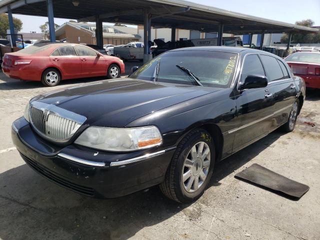 Photo 2 from auction – 2005 LINCOLN TOWN CAR E with VIN 1LNHM84W55Y660107