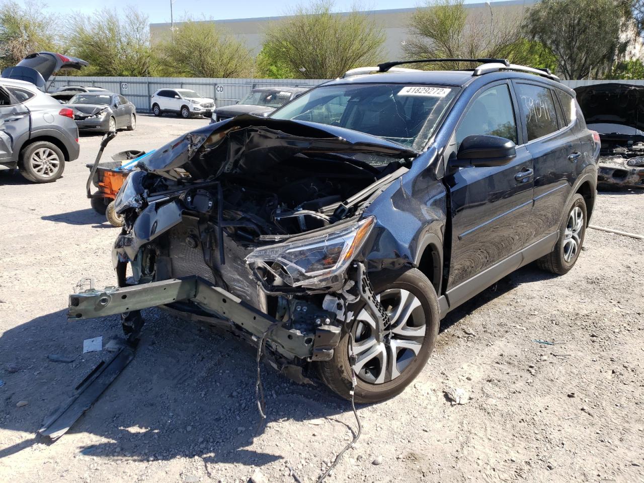 Photo 2 from auction – 2018 TOYOTA RAV4 LE with VIN JTMZFREV4JJ208229