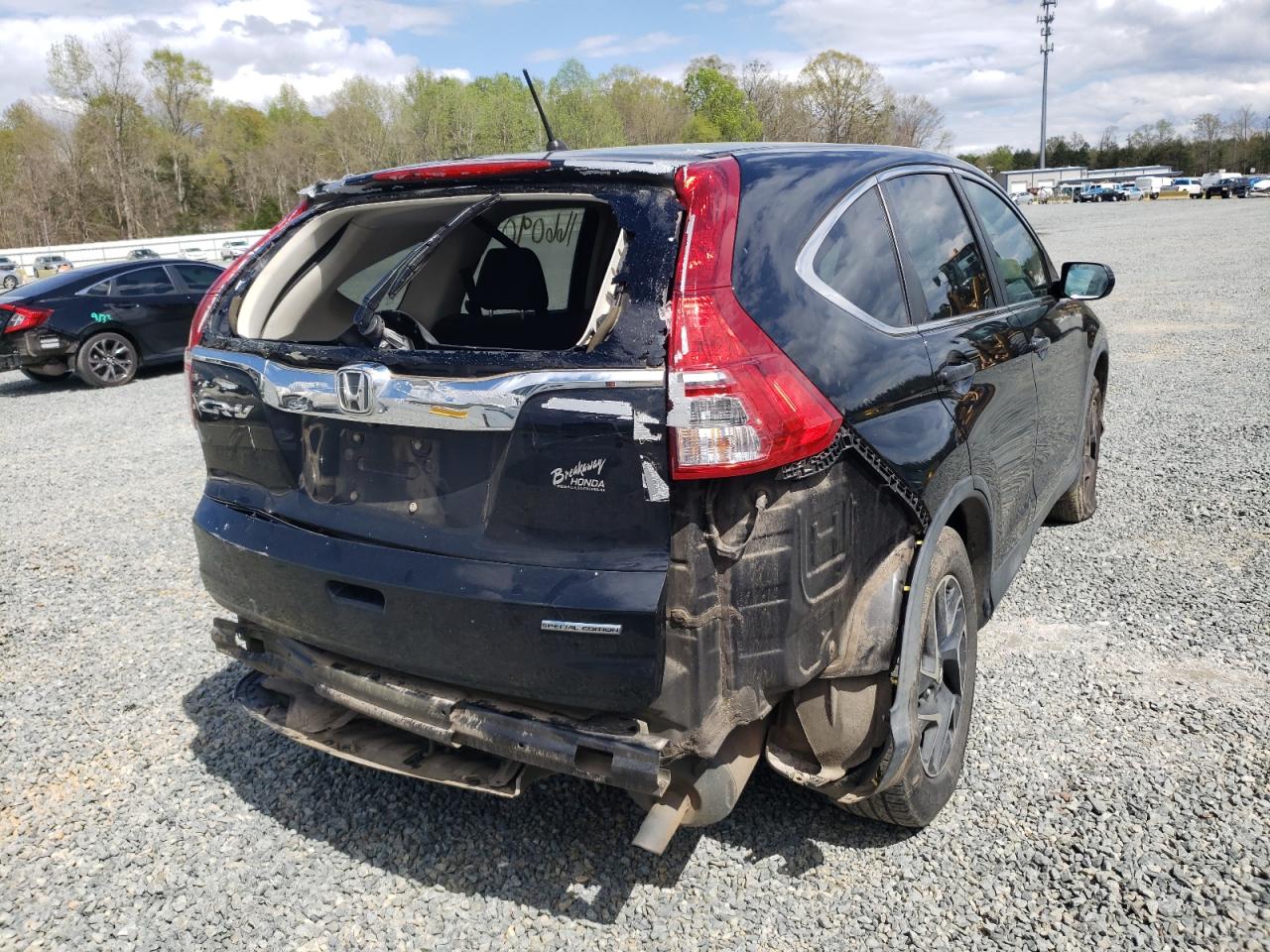 Photo 4 from auction – 2016 HONDA CR-V SE with VIN 2HKRM3H48GH517175